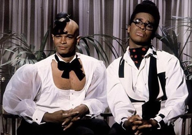 MessyMyles's tweet photo. "Lights, camera, sass! 🎬✨ Meet Blaine Edwards and Antoine Merriwether, the iconic movie critics from 'In Living Color.' Bringing you reviews with flair and a smile! 🌟🎥 #TwoSnapsUp #InLivingColor #Halloween2024 #MenOnFilm https://t.co/pNUflie5Zq
