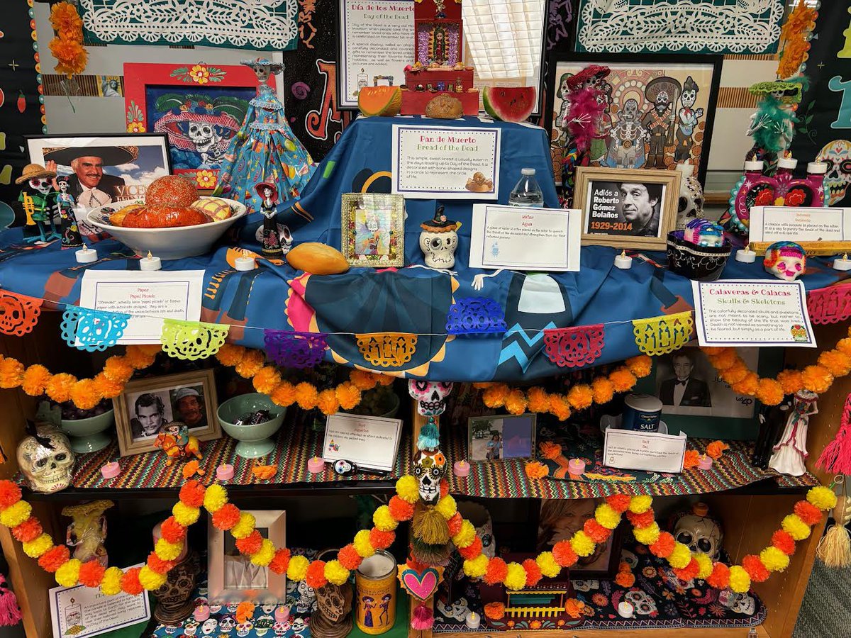 SWISDLibraries's tweet photo. Here is the amazing Dia de los Muertos display in the Library set up by our Hispanic National Honor Society students at SWHS!
#weareSW 
#SwisdLibraries https://t.co/yKLbH73NEa