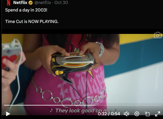 This girl is using her walkman like an iPhone. My culture is not a costume