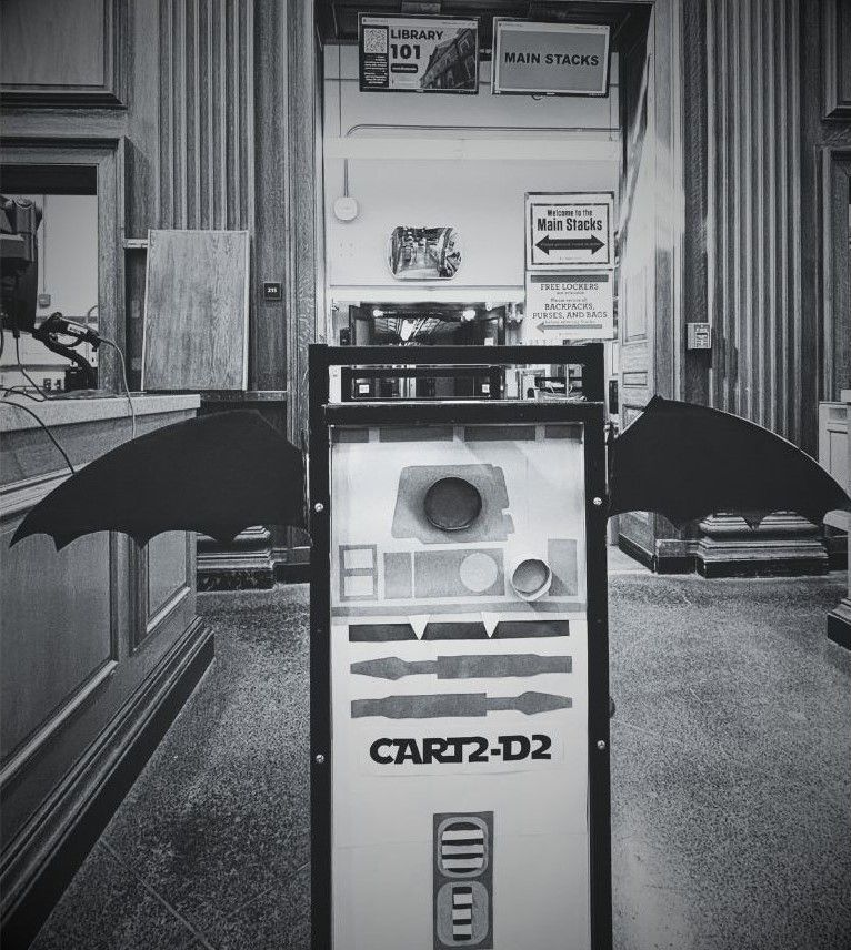 Cart2-D2 wanted to dress up for Halloween this year! Isn't he the most adorable vampire bat you ever did see? And he looks just like this old photo we found laying around! What a coincidence!
