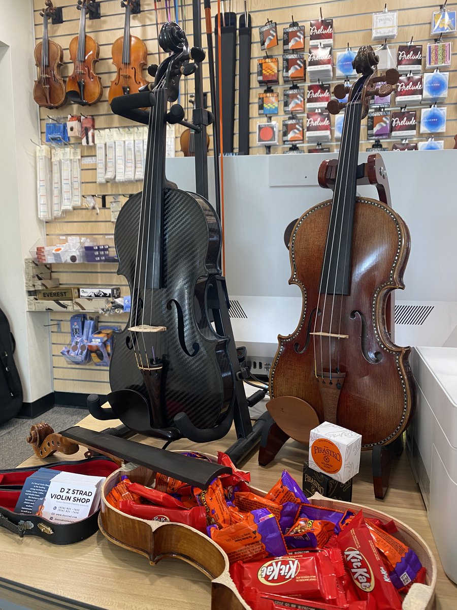 DZAmerica's tweet photo. Nothing but treats here. Our Black Friday Sale is in full swing! Lowest prices of the year in store and online @ https://t.co/NAJpQWyzrj         #halloween #spookyseason #blackfriday #violin #viola #cello #doublebass #bass #reeses #kitkat #metronorth #nyc #grandcentral  #luthier https://t.co/5sgYn6LPH2