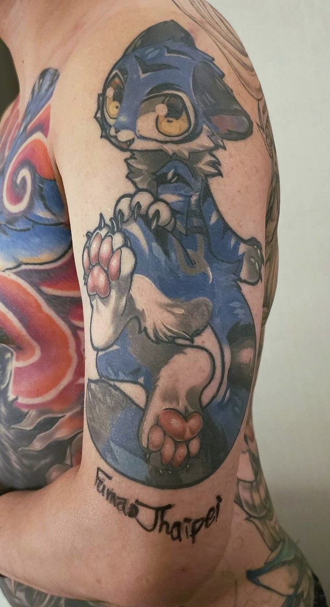 I have my fursona permanently tattooed on my body. It symbolizes my identity, and it also shows my love towards myself as a furry for most of my lifetime and reminds me of moving forward.