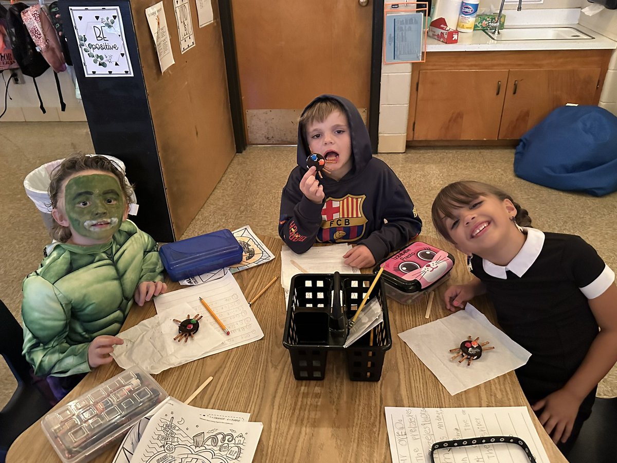 MrsRhodenIn1st's tweet photo. Spider writing and spider cookies! @HydeElem @HydePrincipal https://t.co/61aJvoJ7wM