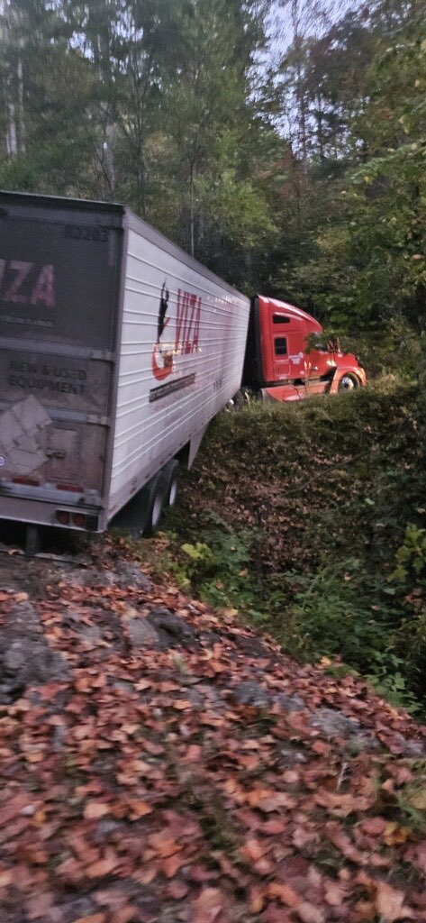 Christ_Rangers's tweet photo. Members of the Christian Rangers who were on their way to support us out in the mountains stopped to help a trucker get unstuck. We will always help out if we are able to! #WNCStrong https://t.co/lnz58CgCSg