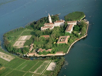 The first of the haunted sites in our latest episode is Poveglia Island, a small but beautiful island near Venice. 
These shots give you a good view of the canal, octagonal fort, and the hospital with its infamous tower. Give us a listen to learn more!