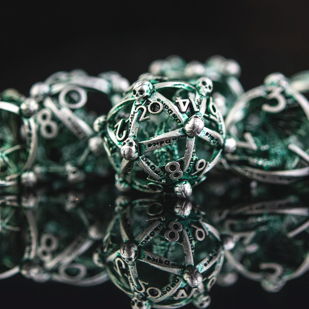 MistyMtnGaming's tweet image. Embrace the dark and mystical this Halloween with our Draco Immortui Hollow Metal Dice Set. Perfect for games that crave a little extra bite! 🎃🐉💀 

shorturl.at/DCsNk
#DND #DiceAddict #NerdyThings #RollForInitiative #TabletopRPG