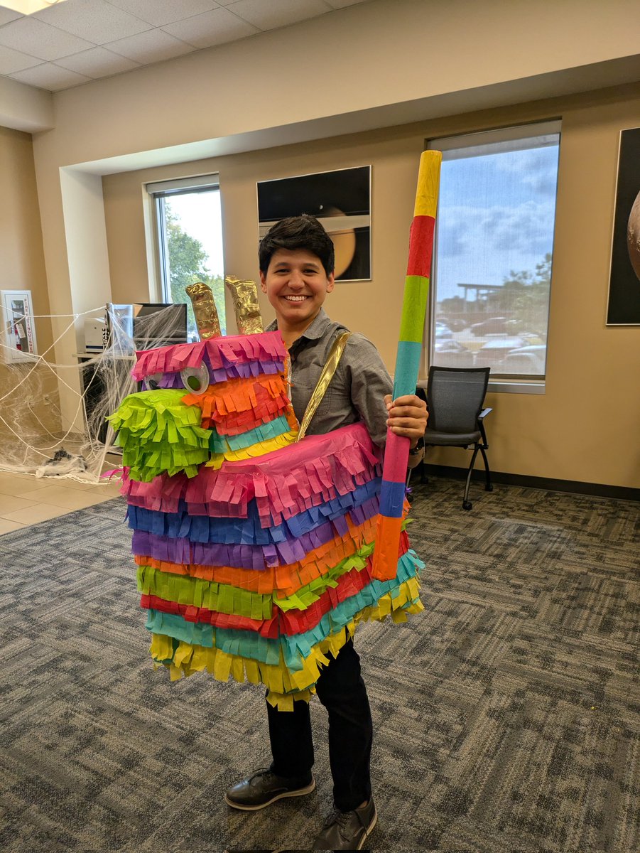 I did not win the costume contest at work BUT I did finally find a use for old conference posters (a stick for your coworkers to hit you with)