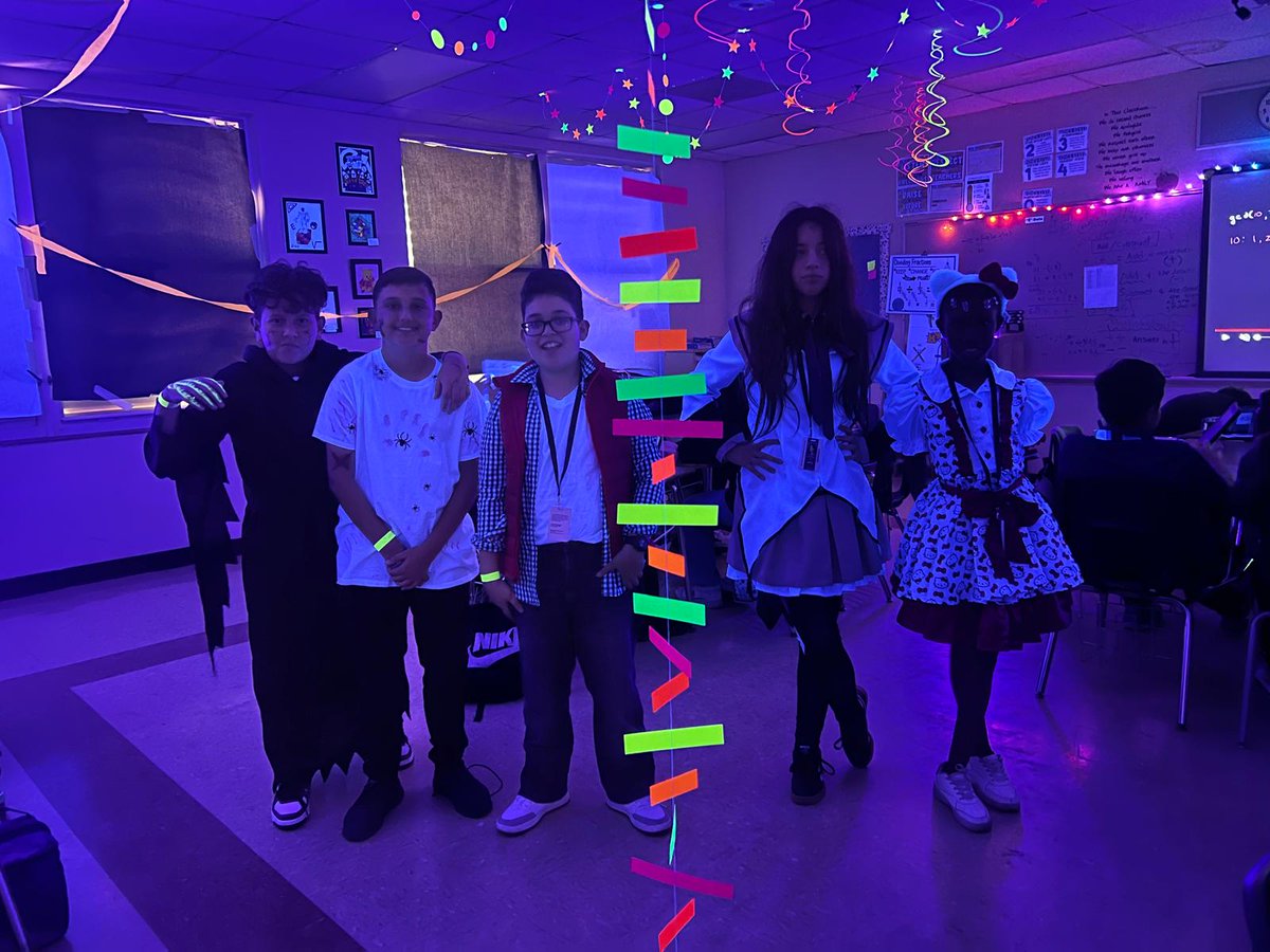 ShenandoahMS's tweet photo. How cool is this! It was a Glow Day in Ms. Sanz's math classes. They worked with highlighters and used black lights and glow in the dark items to solve problems and decorate the classroom. #SMSMath #YourBestChoiceMDCPS @MDCPS @mdcpscentral @SuptDotres @miamimagnets @MariTereMDCPS https://t.co/hF3yFjjozf