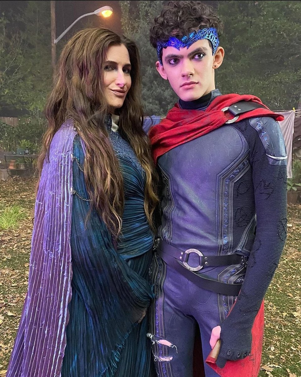 BillyKaplanUpd's tweet photo. Kathryn Hahn and Joe Locke in their incredible costumes on set for #AgathaAllAlong Episode 8 💜💙🔥 https://t.co/kmrcvBloUH