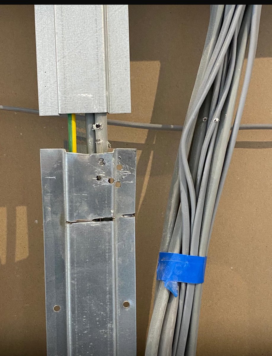 brooks_e's tweet photo. @symphonygroup how do you explain this potential H&amp;S disaster?! 
Drilling kitchen cupboards into live electrical cables!! 🤦‍♀️ https://t.co/k9mMNh9mk7