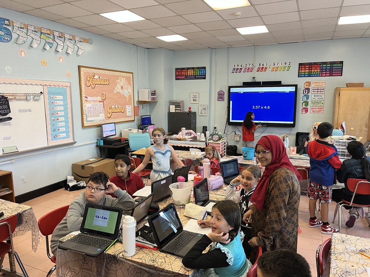 MissToscanoIT's tweet photo. We had some Halloween magic happening in math classes 148 and 145 today. Students “trick or treated” around our room to practice multiplying decimals with jeopardy, challenge cards, virtual trick or treat houses, and color by multiplication equation numbers! 🎃🐾 https://t.co/bW1JdGNa39