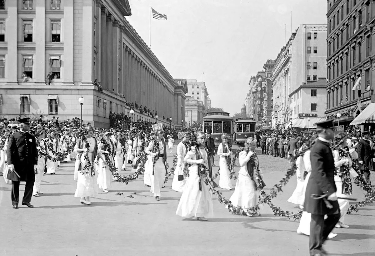 Women in white march for right to vote, 1914, DC: