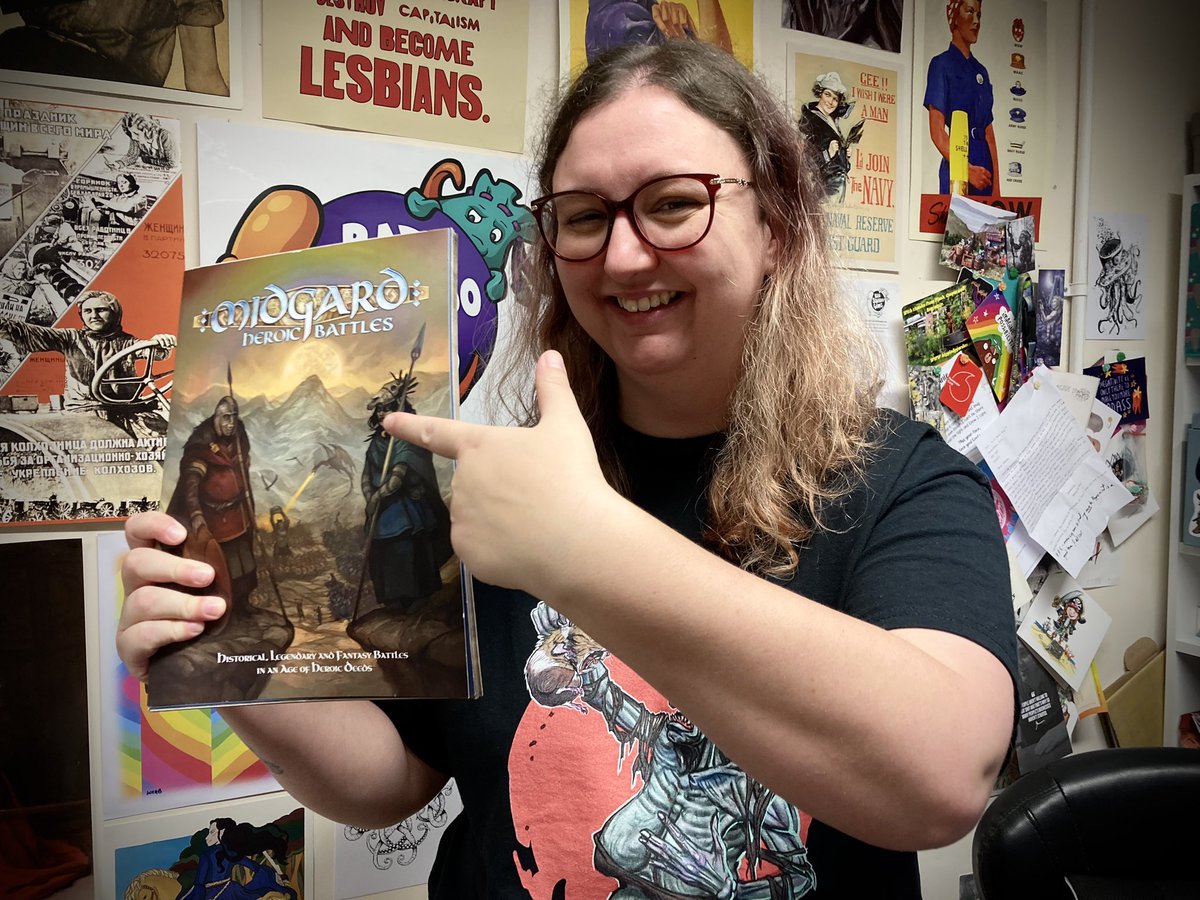 mogsymakes (@mogsymakes) on Twitter photo Always a pleasure to catch up with <a href="/badsquiddogames/">Bad Squiddo Games (Annie)</a>, who was chuffed to see the print proof for Midgard & play ‘spot the Bad Squiddo mini’. Sadly I had to take it back afterwards - looking forward to seeing the real thing in Nov. #midgardheroicbattles #spreadthelard #nerdlings Always a pleasure to catch up with <a href="/badsquiddogames/">Bad Squiddo Games (Annie)</a>, who was chuffed to see the print proof for Midgard & play ‘spot the Bad Squiddo mini’. Sadly I had to take it back afterwards - looking forward to seeing the real thing in Nov. #midgardheroicbattles #spreadthelard #nerdlings