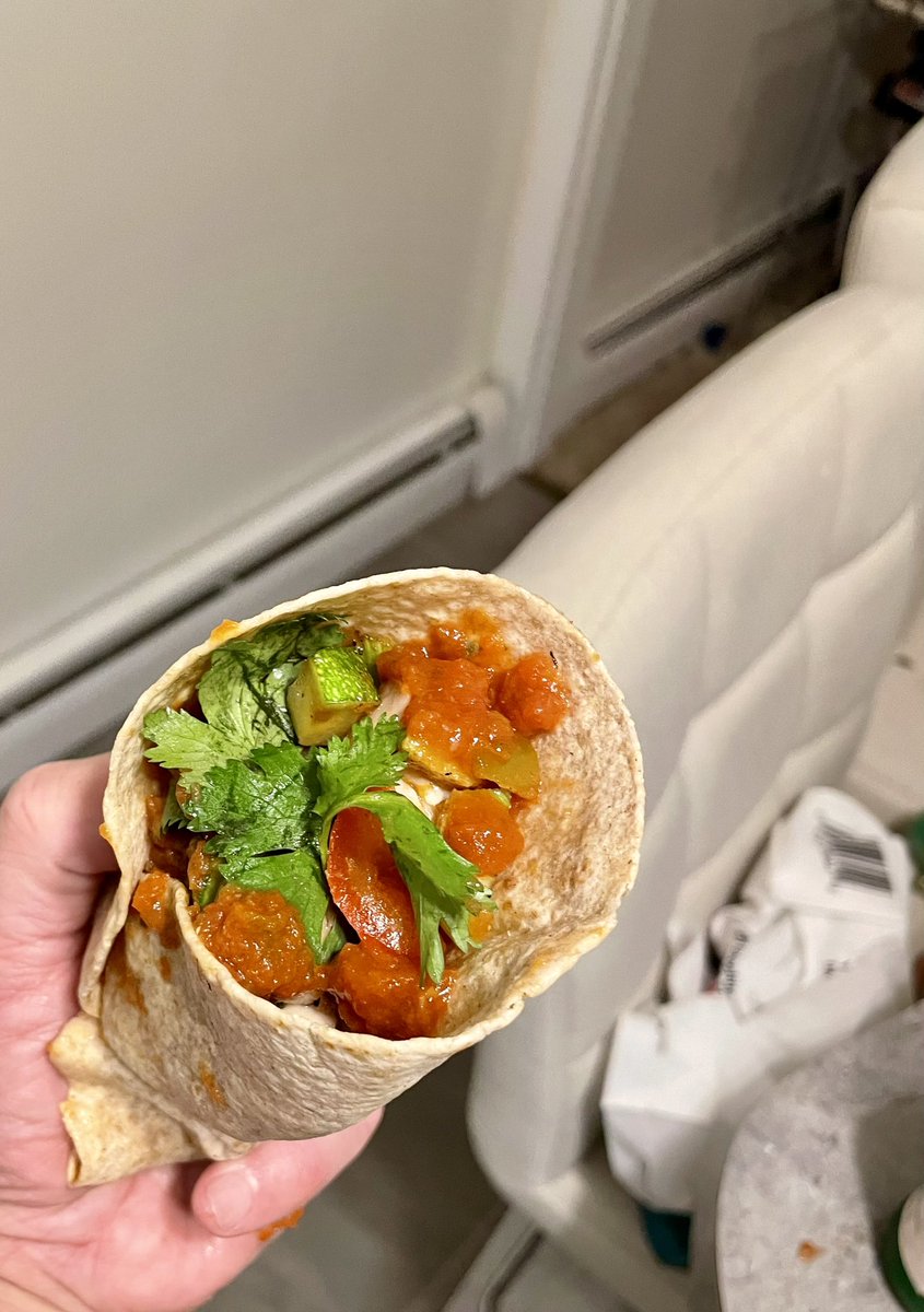 My handheld fajita. With chicken, fennel sausage, red onion, chopped celery, red bell pepper, zucchini, cilantro, lime juice, SPG, and salsa on a whole wheat tortilla that was lightly grilled, but still soft. So damn good I made three of them.