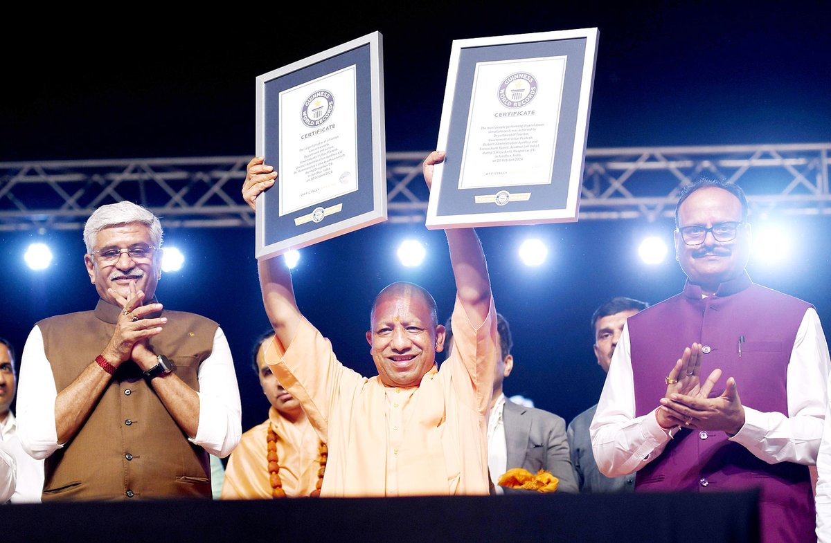 Yogi Adityanath ji receives the certificates of 2 new Guinness World Records created during the Deepotsav celebrations in Ayodhya Guinness World Record created for most people performing 'diya' rotation simultaneously &amp; largest display of oil lamps with 25,12,585
<a href="/narendramodi/">Narendra Modi</a> 🎇