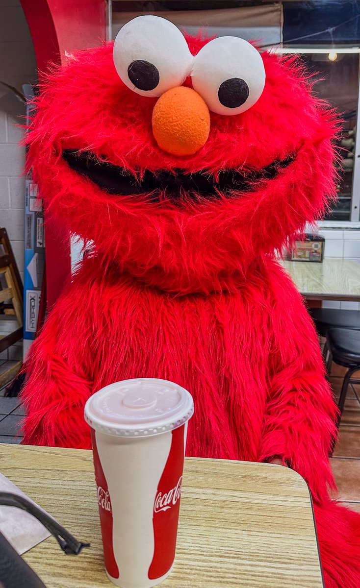 KWOOatCa's tweet photo. Halloween Thursday Dinner - His Favorite Mexican Restaurant. Elmo picking up his combo plate - Chicken Enchilada and Chile Relleno https://t.co/aQZ2QvhvA2
