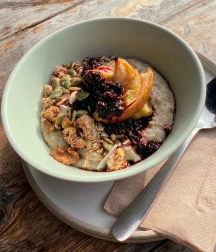 It’s finally porridge season! We’ve launched the return of our delicious porridge with an absolute joy of seasonal goodness- roast cinnamon apples with a blackberry drizzle &amp; crunchy seedy almond granola. Come grab a bowl. Pics by Kate. #Cardiff #cardiffbreakfast #cardiffcafe