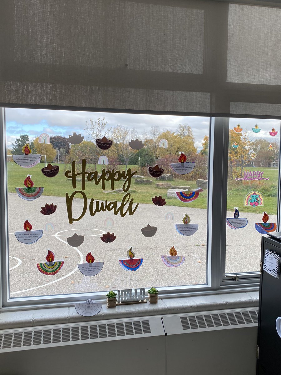 Our windows were looking festive for Diwali, Halloween and Day of the Dead!