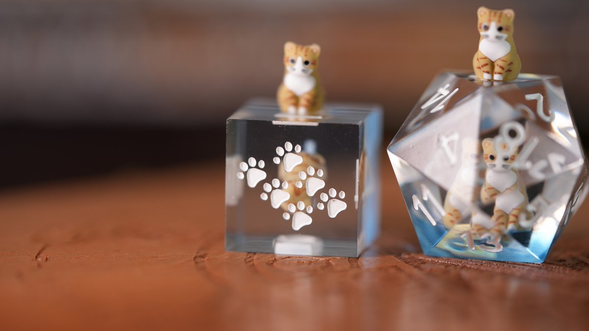GamersNexus's tweet photo. We just launched our new tabletop gaming dice sets, one of which uses e-waste inductors and one which has Snowflake within. These include a 3-piece wooden dice box and roll tray, 7-piece dice set (D20, D12, D10, D00, D8, D6, D4), a custom card for each set, and more.