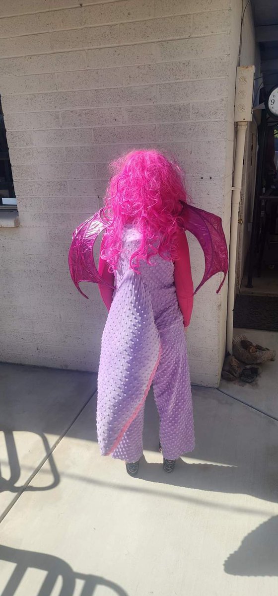 This is my costume that I went trick or treating in my step dad did the wings. Next year better mask, slippers with three black claws, attachable tail, maybe some fur warmers, and gloves.