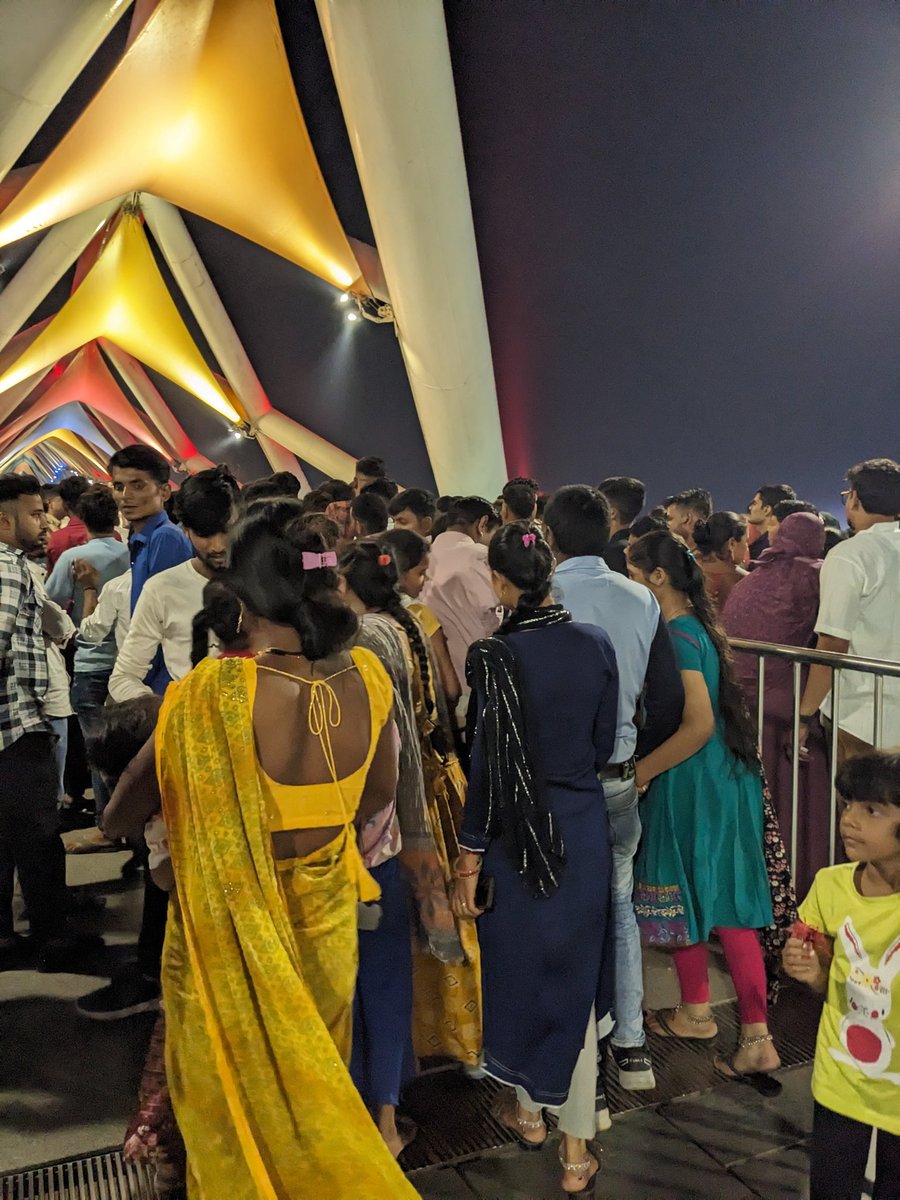 After two hours of being stranded on the other side of Atal Setu finally people allowed to go across. Ticket counter closed so free entry now  at the site in Ahmedabad. Thanks to <a href="/AmitShah/">Amit Shah</a> visit. Crossing was like a stampede had a horrid time with small kids.