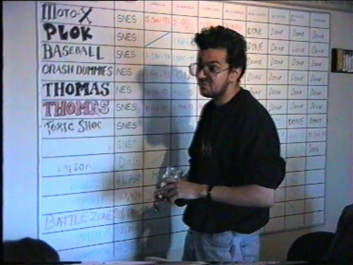 The project board at Software Creations from some time around December 1993.

Moto-X ( Released recently! )
PLOK
BASEBALL ( Ken Griffey Jr. )
Crash Test Dummies
Thomas the Tank Engine ( NES Unreleased )
Toxic Shock ( Abandoned )

Anthony Anderson ( Artist, MIA ), making a coffee!