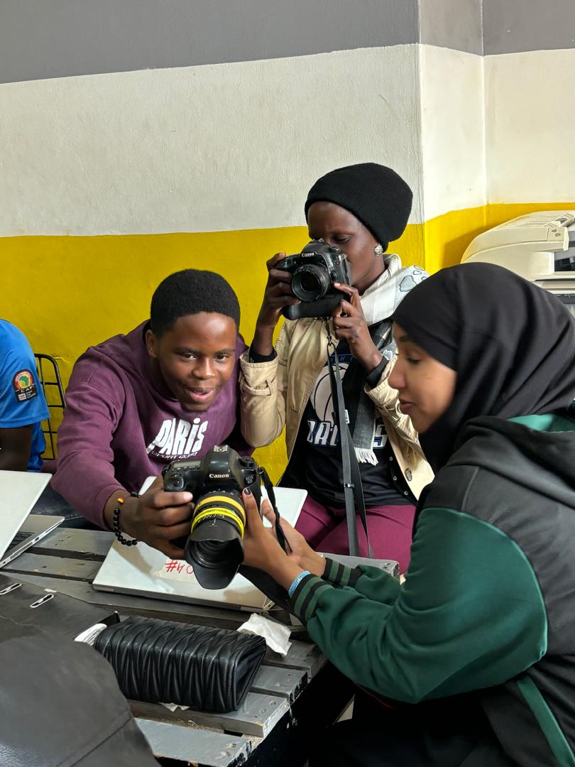 aspirekampala's tweet photo. Snap. Learn. Repeat! 
Today, our students sharpened their photography skills with the amazing Gilbert! They're ready to enhance their digital projects with pro visuals.

Did you know? Aspire Digital also offers photography &amp; videography services for businesses! #SkillsforReugees https://t.co/GBmTGg1zwA
