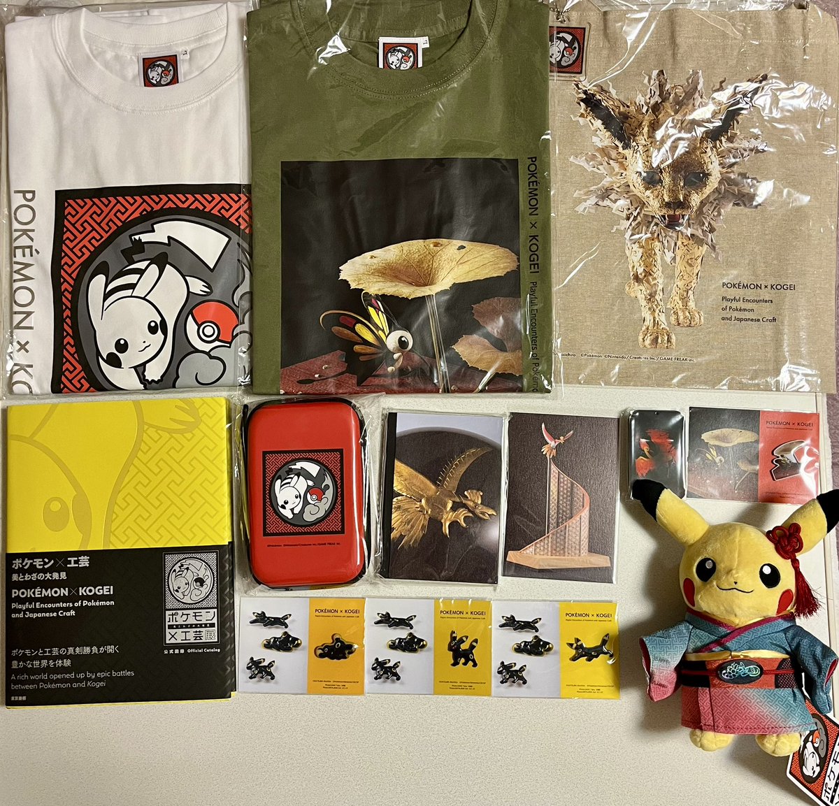 購入したグッズ。欲しいものありすぎて迷ったけどブラッキーのピンズは