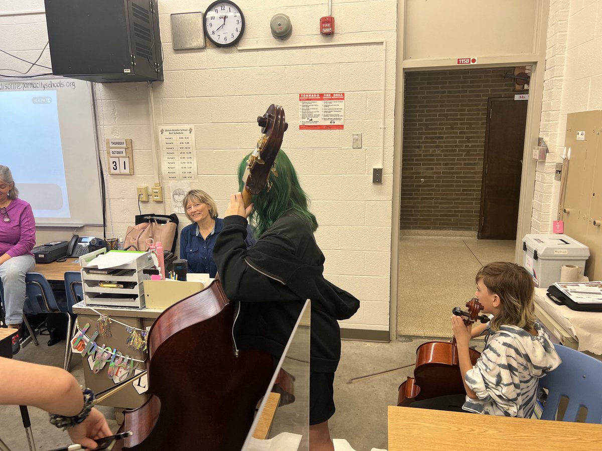 Mrs. Poole’s orchestra playing ‘Happy Birthday’ to staff member Linda Kennison