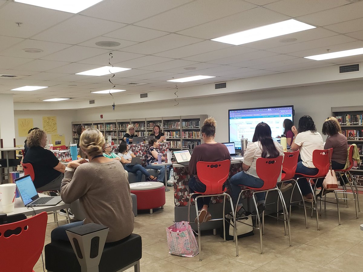 Learning librarians at work in the amazing new VBHS media center. Thanks <a href="/vbhsmediamagic/">VBHS Media Center</a> for hosting. Thanks <a href="/BurnsAshlen/">Ashlen Burns</a> for the information. @IRCSchools #readingrocks