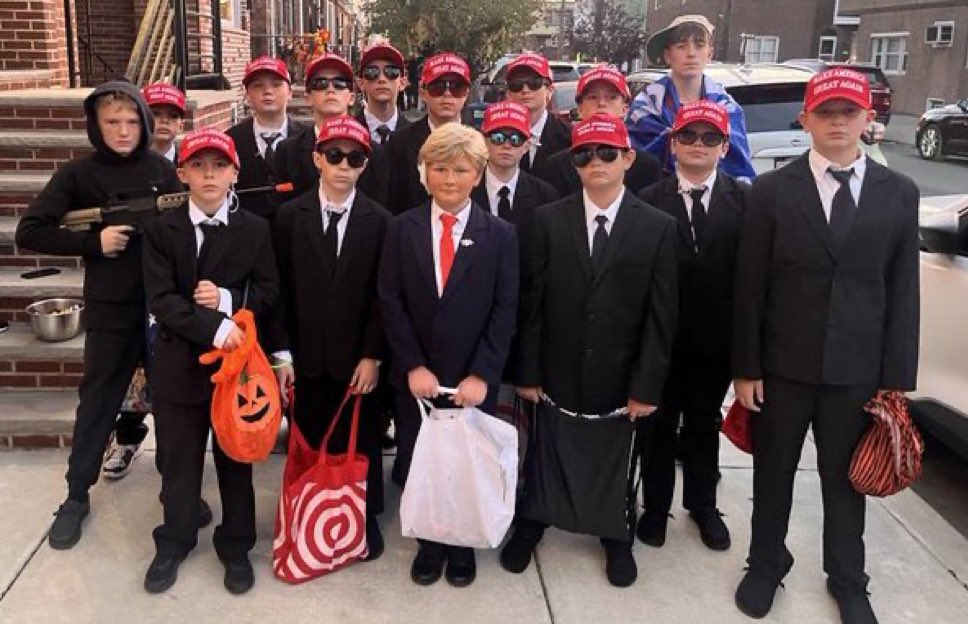The most depressing picture you’ll see….and what’s the kid with the gun supposed to be….the kids all look miserable….this is all their stupid parents making them do this