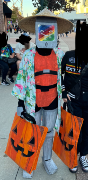 astranomicI's tweet photo. @KreekCraft Me in my handmade costume! Character is momo from the video game stray :) https://t.co/4QhpzQc3st