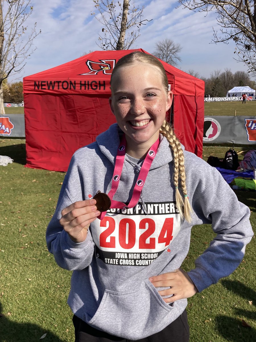 larrypeterson's tweet photo. Creston sophomore Reese Strunk shows her state meet participation medal after running 21:19 in 102nd place at the 3A meet in Fort Dodge. There were 139 runners in the 3A field. She’s the first Creston state runner since Riley Degonia in 2021. https://t.co/u6iymAr8pc