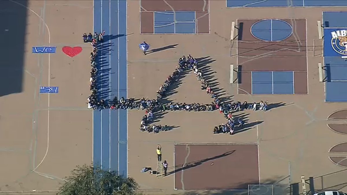 A local school choreographed an in-person display of love for the Dodgers. Albion Elementary School students created a large L.A. logo in the playground before the parade. They also wrote "We love # 34" to honor and Fernando Valenzuela's birthday today 💙 abc7.la/4ebGKc1
