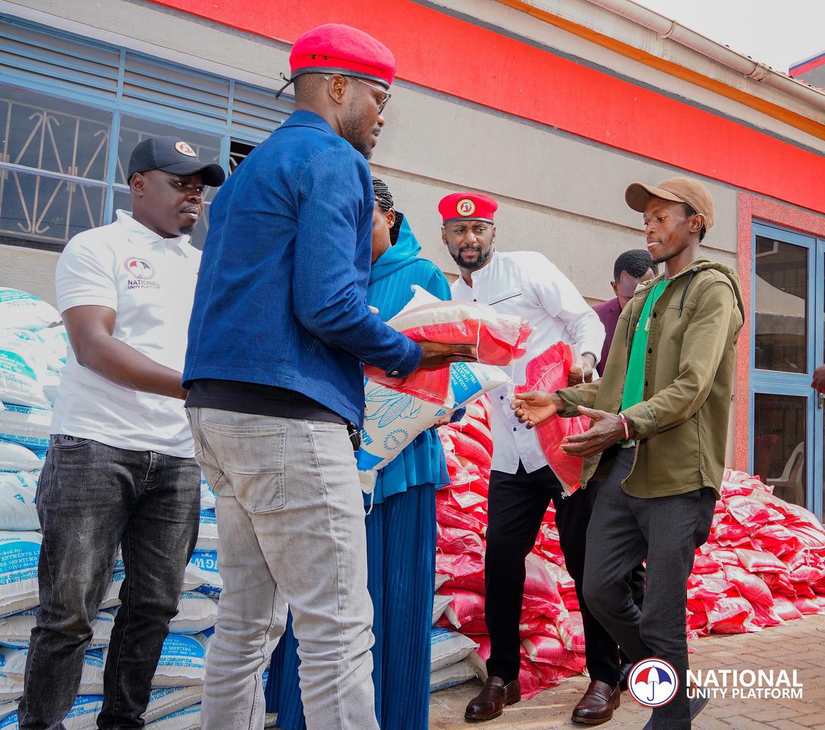 HEBobiwine's tweet photo. Following the public outcry by the starving Government Sponsored students at Makerere University, today we met over 300 of them at the @NUP_Ug Headquarters and shared food items with them to enable them mitigate their suffering. We also served them lunch. These students have gone several months without their living allowances, causing most of them to starve. 

Now organized under 'Makerere Hungry Students Association', they narrated the problems they have had to endure, including some female students being forced to engage in indecent acts trying to survive. Some students have developed ulcers, while others have fainted due to hunger and starvation. SHAME ON THE MUSEVENI REGIME. Each day we see scandal after scandal involving billions of shillings, yet the regime can't find money to feed the few government sponsored students!! How can we build for the future, while students go through such indignity and humiliation? How are they expected to study under the weight of hunger? 

As always, the police tried to block this activity by ordering students not to come or risk being suspended! We are glad that many students decided to come and pick the little relief we had to offer despite the intimidation. The regime will always find the money to deploy and block our activities, but they can't find money to solve the problems causing the discontent! SHAME! We shall only get ourselves out of this crisis by removing a regime that has zero regard for the people!