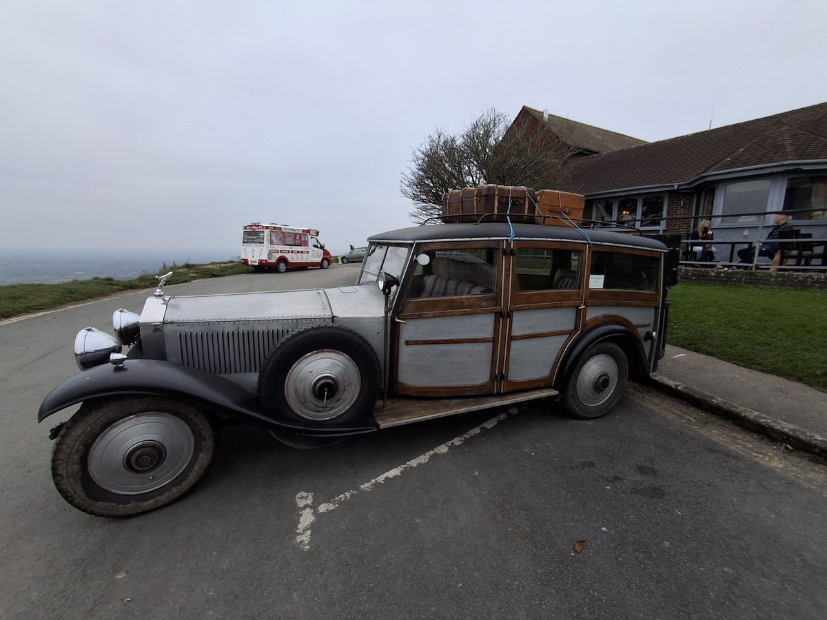 StephensLDN's tweet photo. A very odd looking car at #DevilsDyke this afternoon. Looked kind of home made and cobbled together. Maybe it was really a vintage Rolls Royce. But parking it had clearly been a challenge. https://t.co/Vv46pwblJh