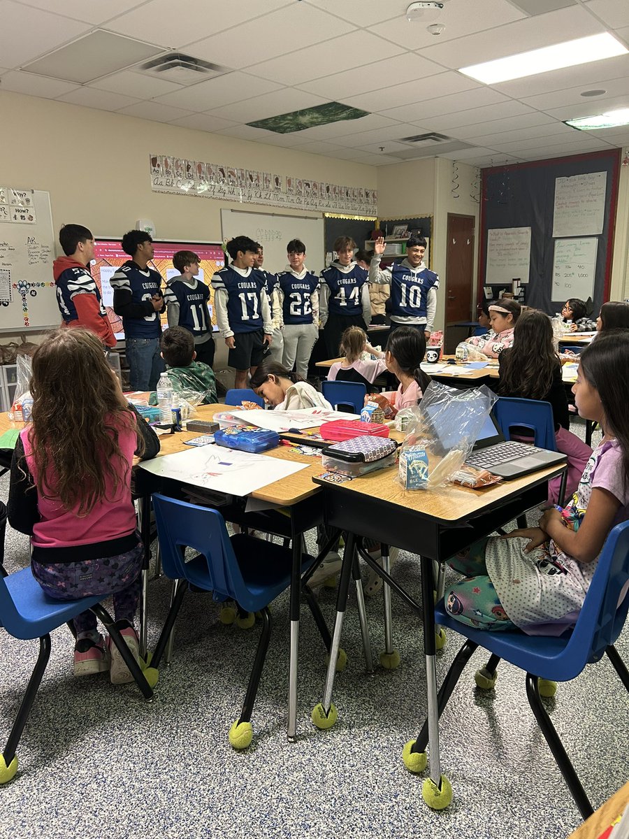 KirkseyFootball's tweet photo. We had a great start to the day as we travelled to Old Wire Elementary to help in the car rider line. Players also got to visit former amazing teachers and encourage future Cougars! #SWAG #Family @kirkseycougars @rogersmountiefb @rhs_21 @PaulADrps https://t.co/GafXVyPSsf