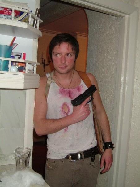 Dylan_L_Jones's tweet photo. @Allllright Here’s a McClane costume from one Halloween. I’d like either the Zodiac BD or the Chucky doll if I’m lucky enough to win! https://t.co/qFmPlUk2Od