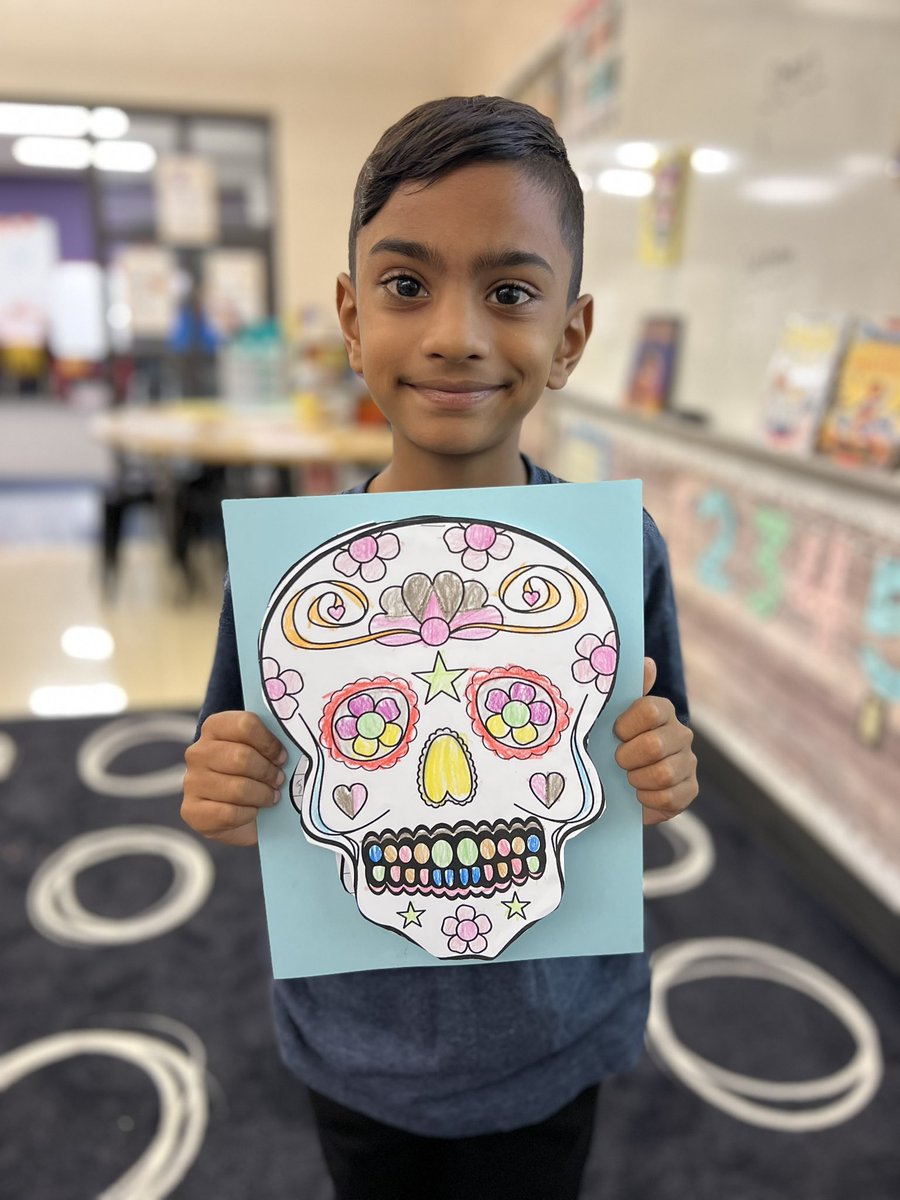 ClassWithMissK's tweet image. Today we learned about Dia de los Muertos! Students created a sugar skull and included facts about the celebration underneath. 💀