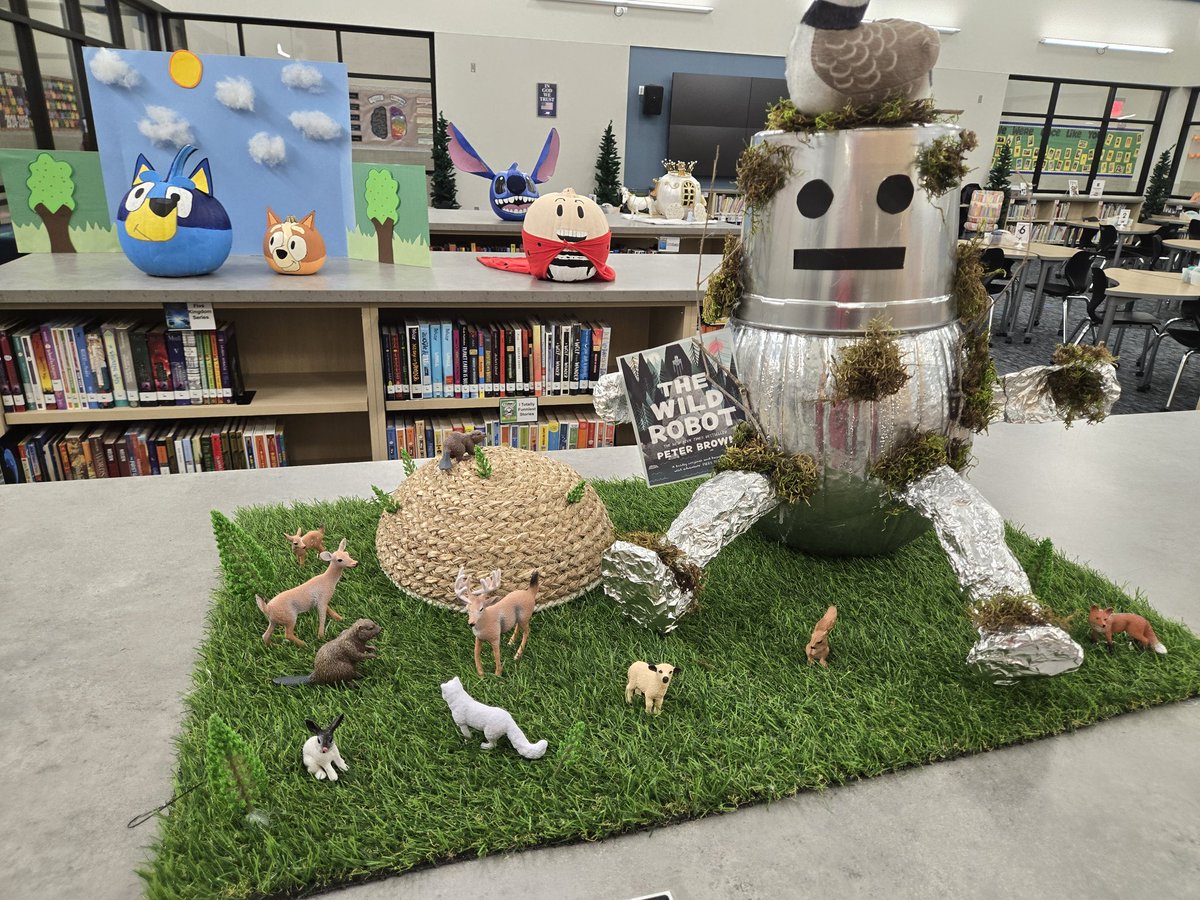 Admin gave each team a pumpkin to decorate. I quickly suggested to our team that we should do The Wild Robot.  I, of course, read all 3 books. I volunteered to put it together. It was really simple to do. The students voted. All the entries were good. WE WON. The prize is lunch.