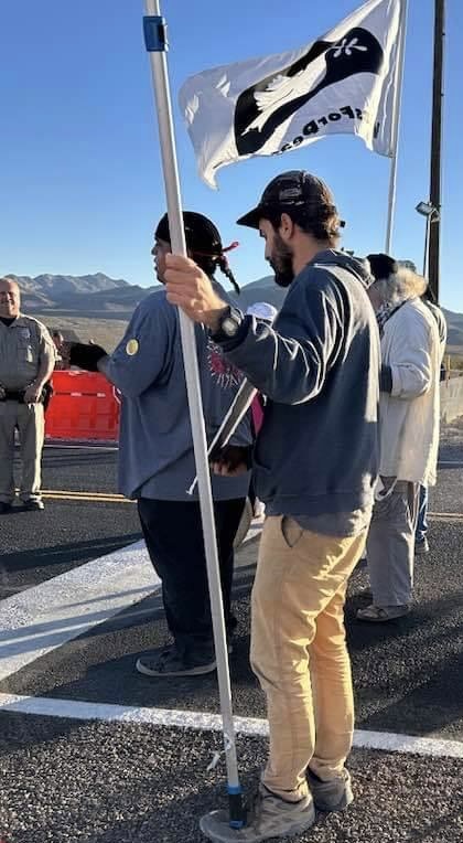NuclearResister's tweet photo. Catherine Hourcade was arrested for trespass on Indigenous Peoples’ Day after crossing the boundary line at the Nevada nuclear test site. She told the officer, “This is sacred Shoshone land and you don’t belong here!” 
Read more at https://t.co/dgHBRAZ4LC https://t.co/ODB6WDFV09