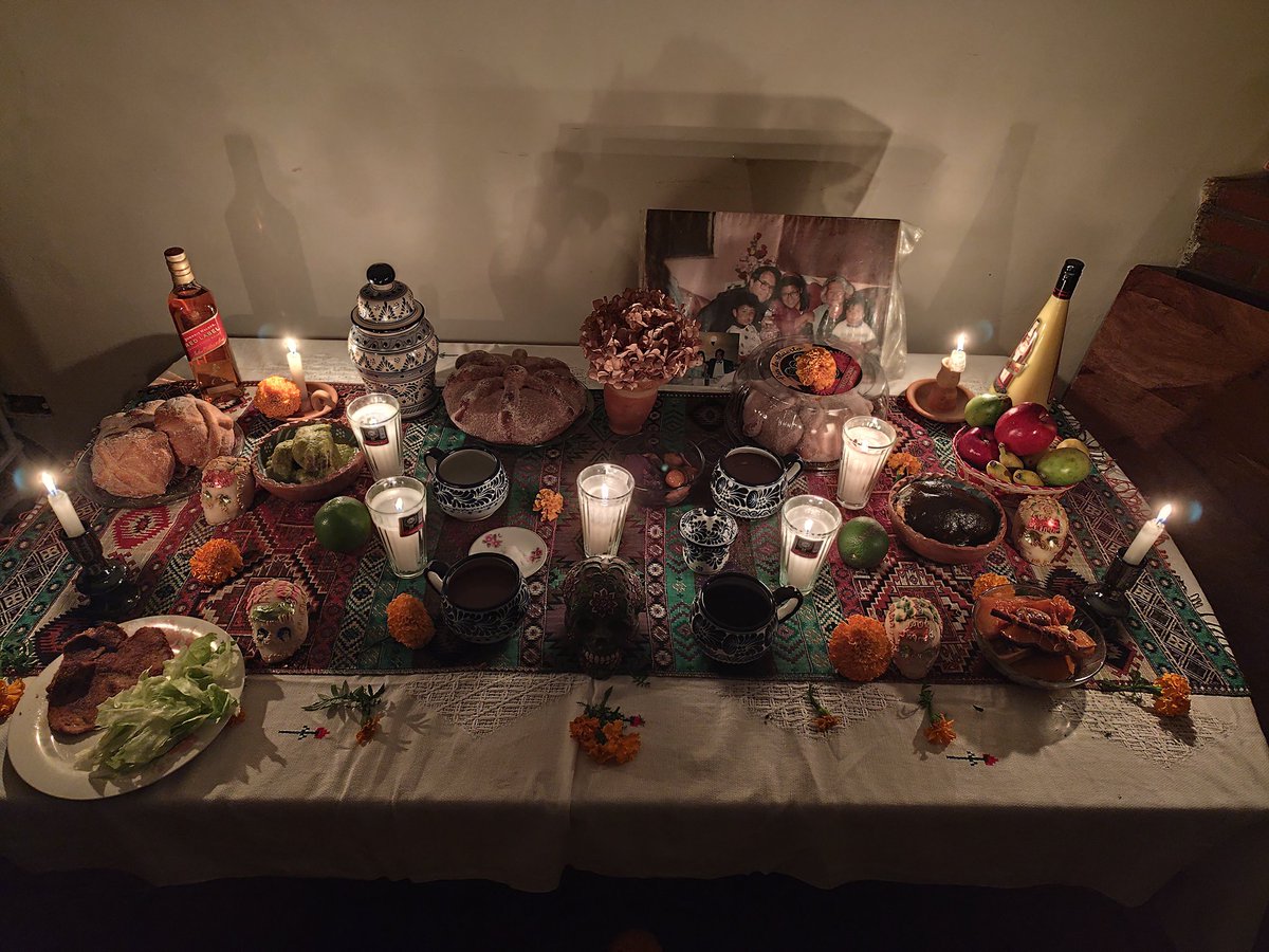 We always remember our dead. Today we also welcome them to dine with us.

Day of the dead altar at my house.