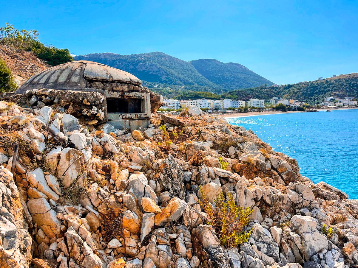 NEFootsteps's tweet image. Cruising along the coastline of Albania: where every beach day comes with a side of surprise bunker