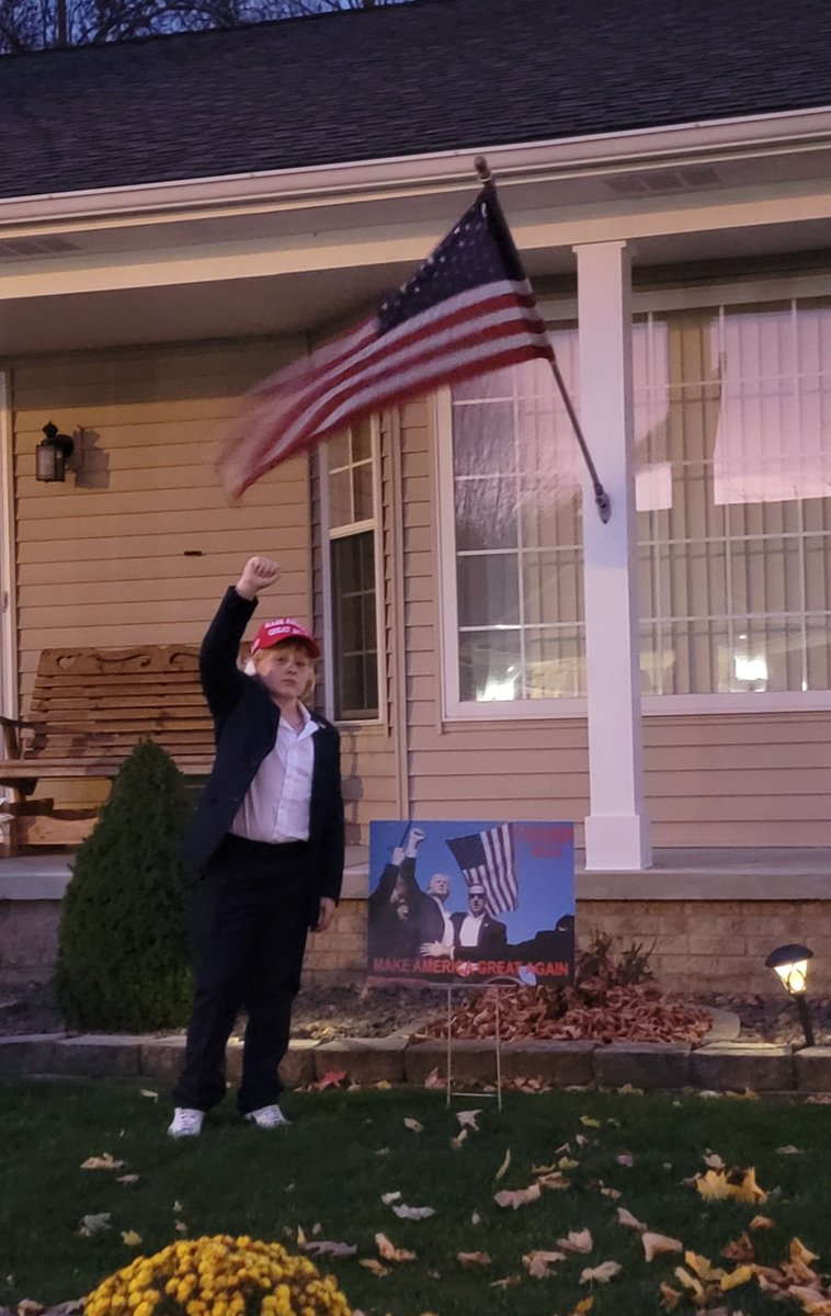 mickiART's tweet photo. Trick or Treating '24 as @realDonaldTrump ! Thank you Mr. President for the inspiration! Rafe dropped the candy and ran up to a house for a perfect photo op! #MakeAmericaGreatAgain 
#fight https://t.co/f4NFS47AFB