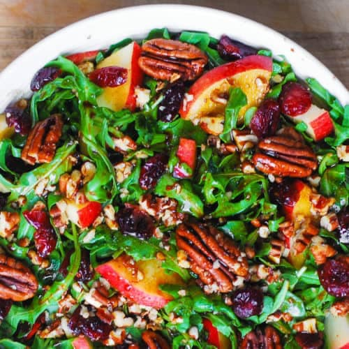 Looking for a salad that’s as crisp and refreshing as a cool autumn day? This arugula salad with apples and pecans is a perfect balance of flavors and textures—peppery greens, sweet crunchy apples, and nutty pecans come together in a mix that’s as delightful as it is simple.