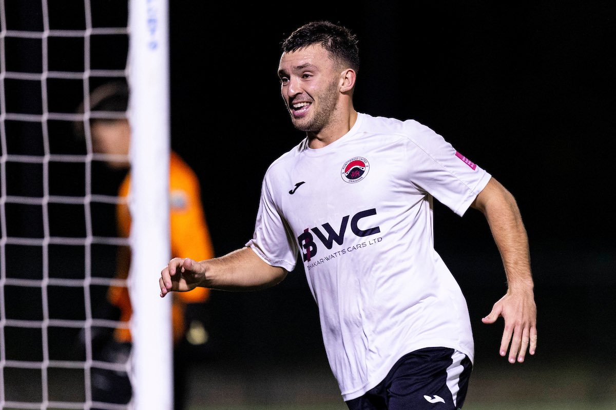 Liam Eason celebrates scoring for Pontypridd United against Ammanford.