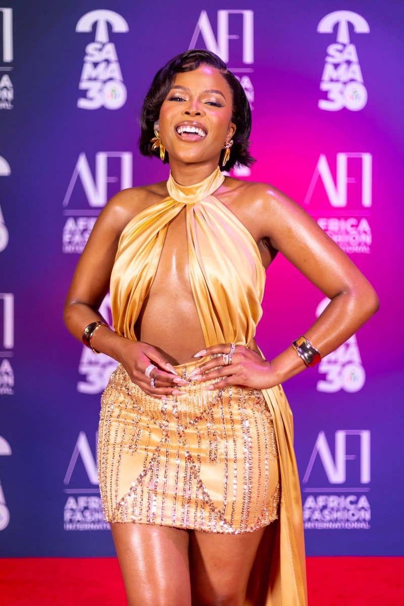 AFI_sa's tweet photo. LIGHTS! CAMERA! GLAMOUR! 📸🎥

The red carpet action has finally arrived at this year’s @thesamas_ awards and @KuhleAdams - the host with the most, is undoubtedly rocking AFI Privé, looking absolutely glamorous.

#SAMA30 #AFIPrive #AfricaFashionInternational #LessNoiseMoreMusic https://t.co/ZbWrMJU3PD