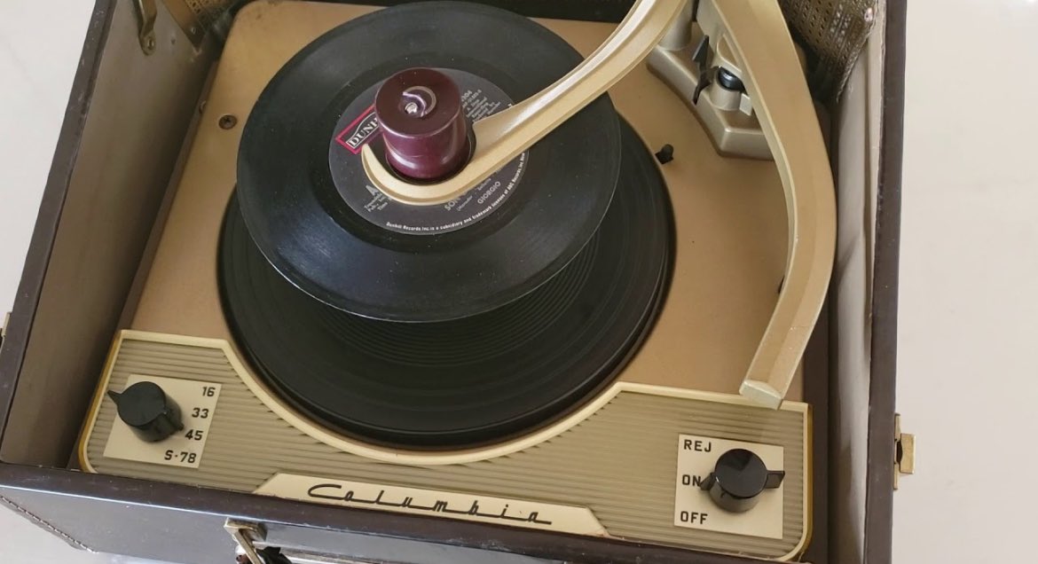 It's a 45 rpm record changer.