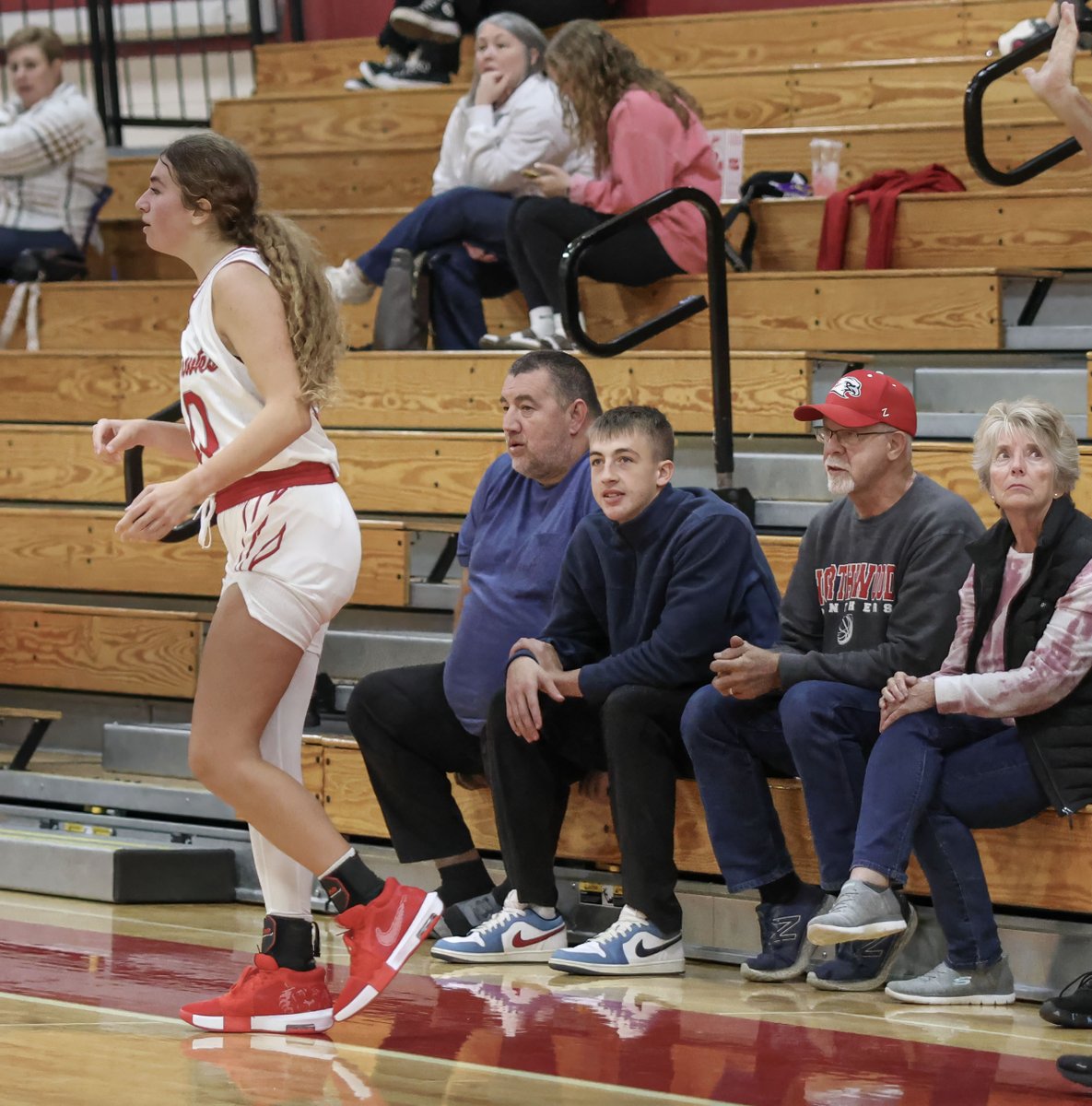Karter gazes in awe at his big sister