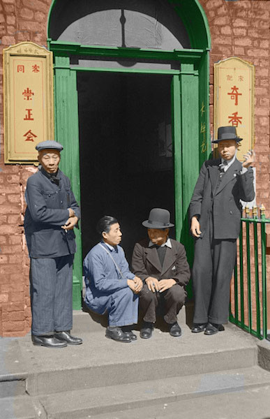 Seamen outside a Chinese hostel in Liverpool, May 1942. Liverpool hosts the oldest Chinese community in Europe.